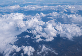 View from airplane at clouds.