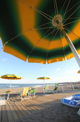 umbrella on the beach photographed from below in the summer during the holidays