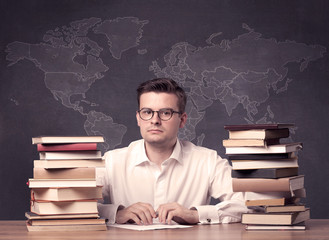 Geography teacher at desk