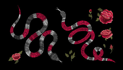 Fototapeta premium snake and red forbidden strawberry fruit. Traditional stylish floral embroidery stitch on a black background. Sketch for printing on fabric, clothing, bag, accessories and design. Vector, trend