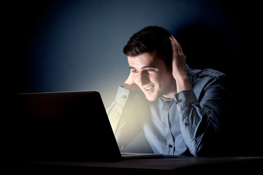 Businessman in the office at night