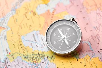 Compass on the tourist map. Navigation tools to orient. Conceptual of tourism.