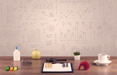 Graph charts and designer office desk