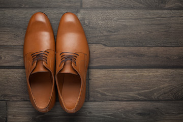 brown shoes on a wooden