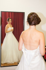 bride in shop mirror try nerw white wedding dress - obrazy, fototapety, plakaty