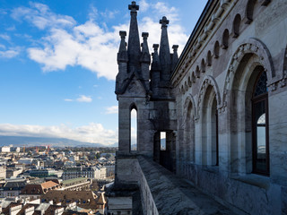 Fototapeta na wymiar View of Geneva from the height of the Cathedral of Saint-Pierre, Switzerland. Blue sky. January, 2018