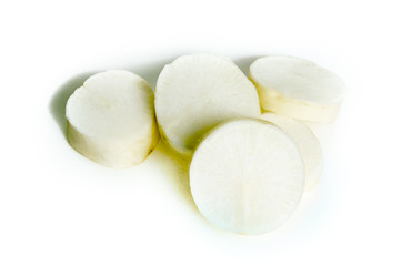 Fresh white radish with slices isolated on white background