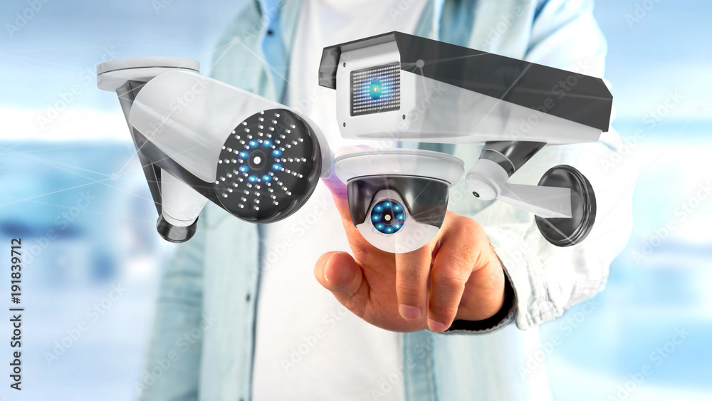 Poster businessman holding a security camera system and network connection - 3d rendering