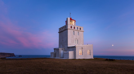 White lighthouse at south iceland coast dyrholaey