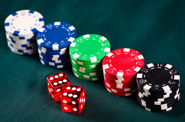 Chips and cards on casino table 