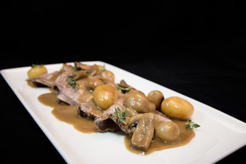 veal fattening black Angus, Dutch onions and mushrooms