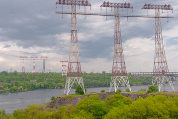 Renewable energy sources and relay masts across the river
