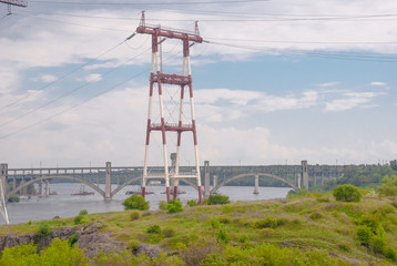 Renewable energy sources and relay masts across the river
