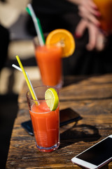 Alcohol orange daiquiri cocktail on beach bar