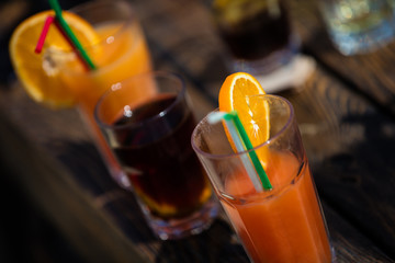 Alcohol orange daiquiri cocktail on beach bar