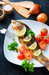 Fried fish served on the plate