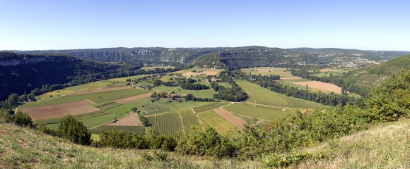 Foto op Canvas The view over patchwork fields and farms encircled by the River Lot. From Saut de la Mounine viewpoint near Cajarc, Lot, Quercy, France. Stitched panorama. © Chris Rose