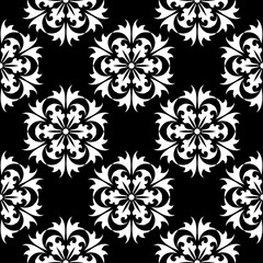 White floral design on black background. Seamless pattern