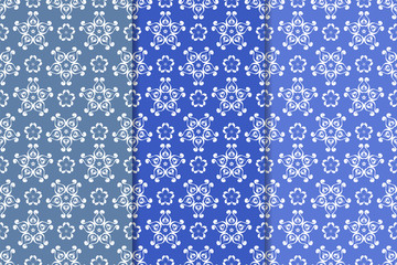 Set of floral ornaments. Vertical blue seamless patterns