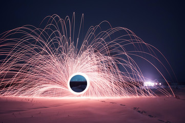 2883256 steel wool photo, a Mysterious portal of sparks in the winter night,