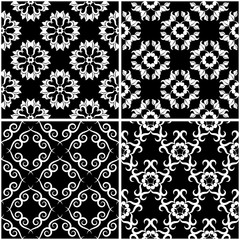 Floral patterns. Set of black and white seamless backgrounds