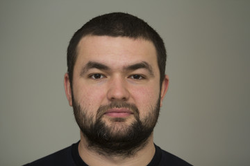 Obraz premium Portrait of a handsome young bearded man