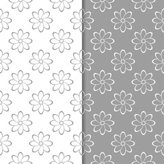 White and gray floral backgrounds. Set of seamless patterns