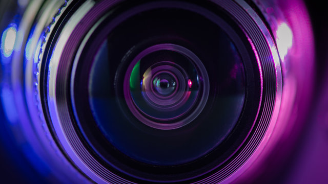 Camera lens and multi-colored backlight blue and purple.