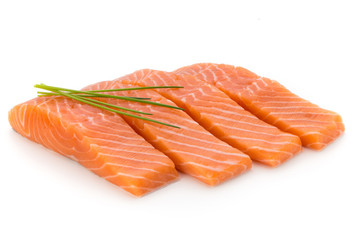 Fresh salmon fillet with basil on the white background.