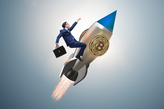 Businessman flying on rocket in bitcoin price rising concept