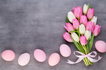 Mother's Day, woman's day, easter, pink tulips, presents on gray  background.