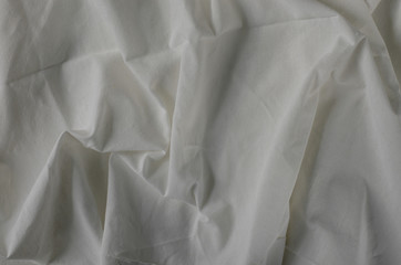 Obraz premium Texture of Crumpled White Calico Fabric.