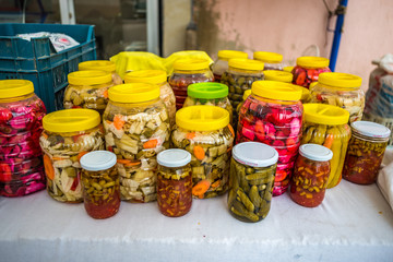 Colored handmade pickled vegetables  at local farmer marketplace