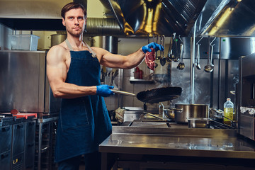 The chef in a kitchen.