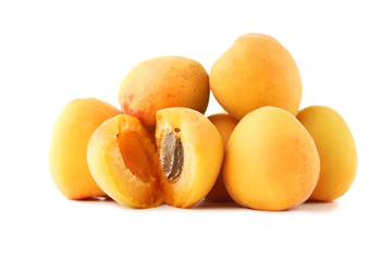Ripe apricots isolated on white background