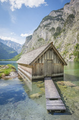 Fototapeta premium Lake Obersee with boat house in summer, Bavaria, Germany