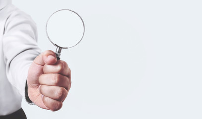 businessman with magnifying glass