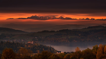 Poland, Autumn Morning. Epic Sunrise Over Tatry Mountains: View At The Top Of High Tatras , Czorsztyn Lake And Ruins Of The Castle. Fantastical View From High Tatra Mountains In Poland.Tatra landscape