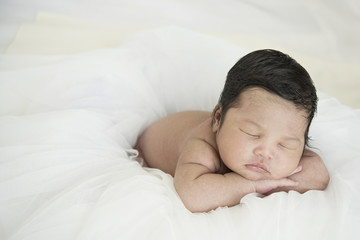 Close-up portrait of a beautiful sleeping baby newborn , 1 week old.
