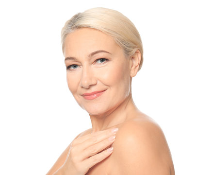 Portrait of beautiful mature woman on white background. Skin care concept