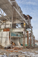 Shell of partially demolished building