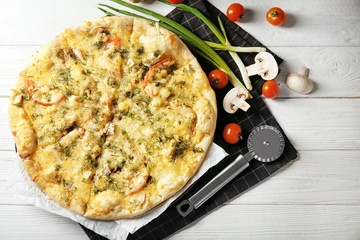 Delicious cheese pizza on table. Fresh from oven