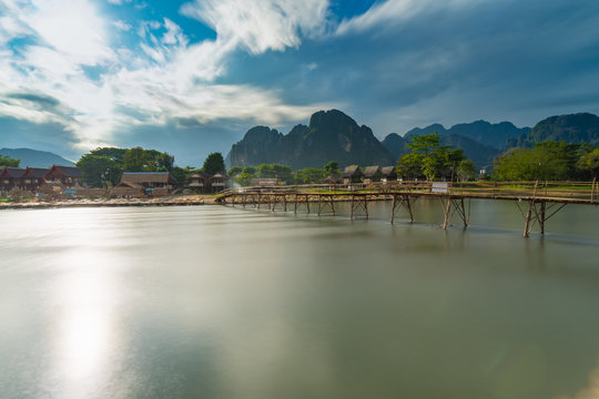 Long exposure Wood bridge on naw song river in Vang vieng, Laos.
