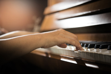 Women's Hands on the Keyboard of the Piano Playing a Melody, Music on the Piano