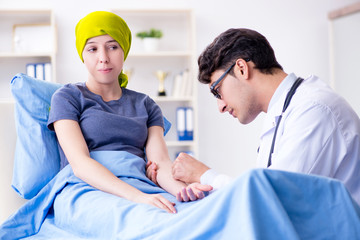 Cancer patient visiting doctor for medical consultation in clini