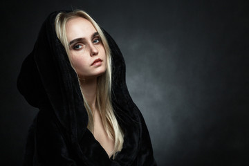 woman in black hood