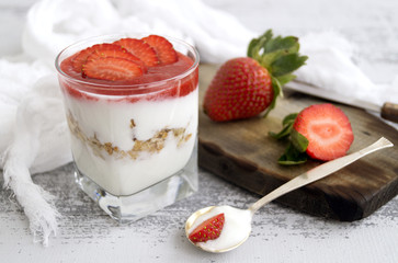Natural homemade yogurt on a light background.