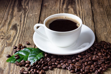 Cup of coffee on wooden rustic table