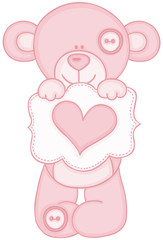 Pink teddy bear holding message with heart
