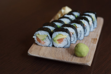 Sushi role on wooden board. Japan cuisine